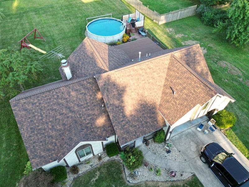 Brown asphalt shingle roof replacement on a two-story home in Fort Wayne, Indiana