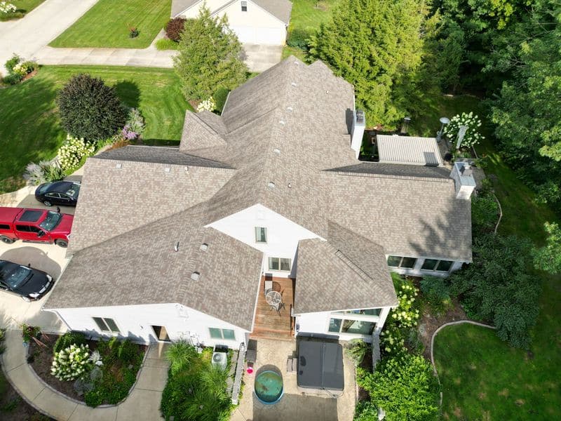 Weathered wood asphalt shingle roof replacement on a large Northeast Indiana home